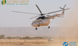 Compania aeriană care a pierdut un elicopter în Afganistan preia o companie de asigurări