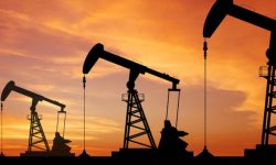 Preţurile petrolului au scăzut, înainte de majorarea dobânzilor de către Rezerva Federală