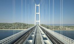 Cine pune bețe în roate celui mai mare pod din lume?