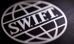 SWIFT declanșează ofensiva financiară: Tranzacții live cu monede digitale în 2024