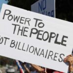 1% din bogații lumii controlează jumătate din banii planetei